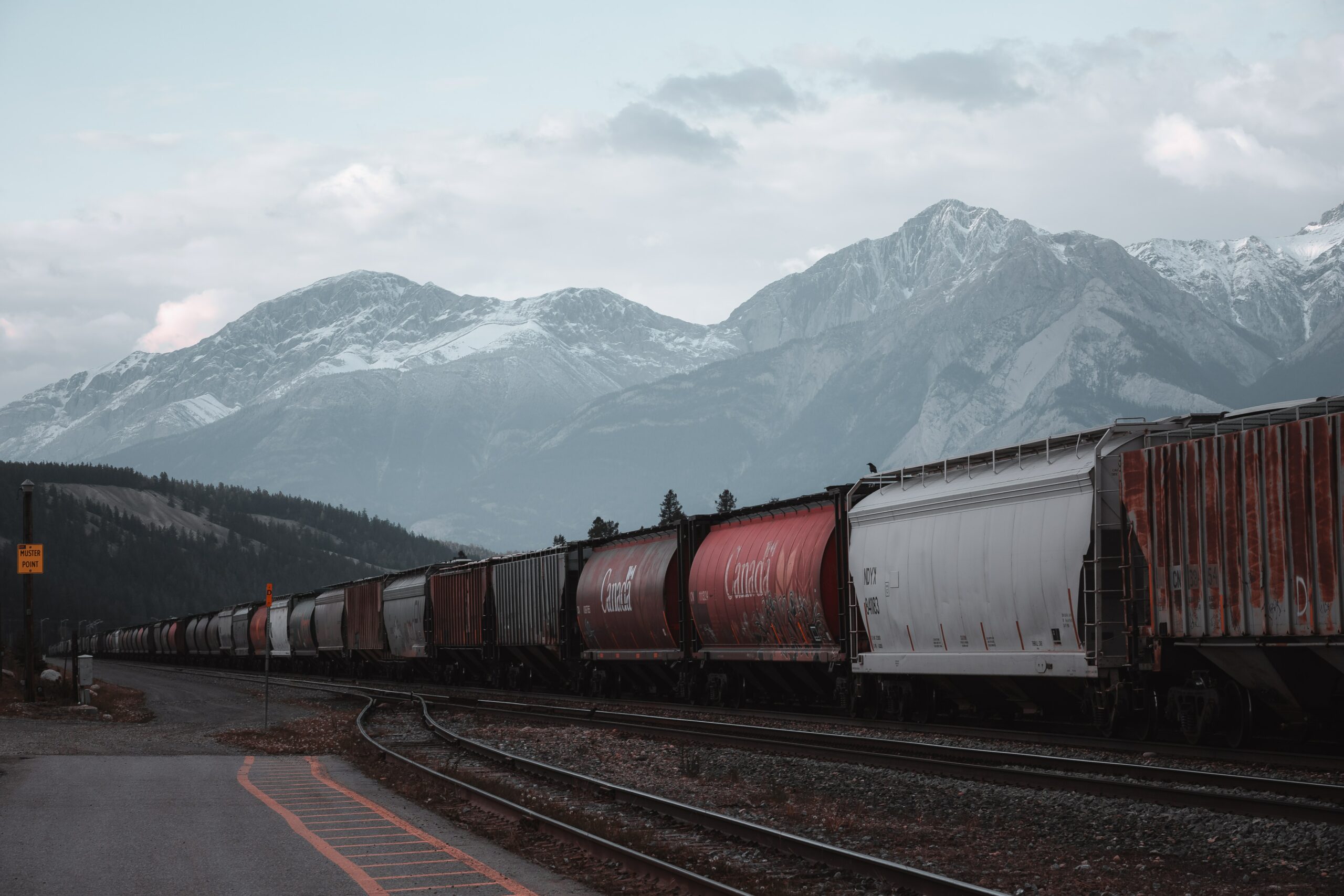 train-on-tracks-mountains-canada