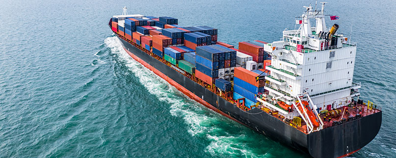 Aerial view cargo container ship sailing, container cargo ship in import export and business logistic and transportation of international by container ship in the open sea.